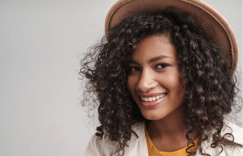 How to style curls under a hat